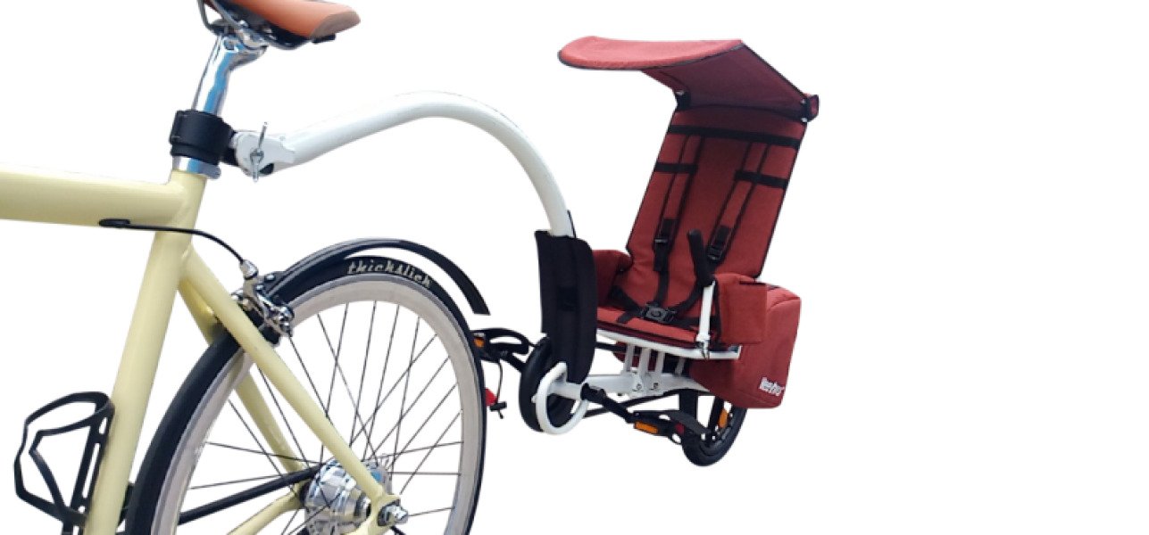 Weehoo Thrill pedal trailer bike with panniers for rent image